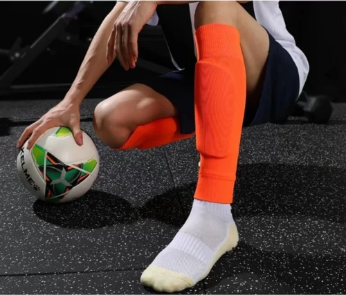 1 Paio Calzini Al Polpaccio Da Calcio Arancioni Spezzati Protezione Calcetto