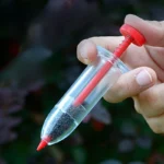 Dispensatore semi portatile tubo trasparente ergonomico giardino