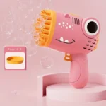 PISTOLA SPARABOLLE DI SAPONE 40 FORI A FORMA DI DINOSAURO PER BAMBINE ROSA