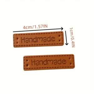 20 etichette finta pelle artigianali sciarpe cappelli toppe PU cucito maglieria