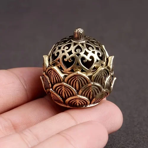 472-0.webp 1x mini bruciatore incenso loto metallo traforato aromaterapia interno